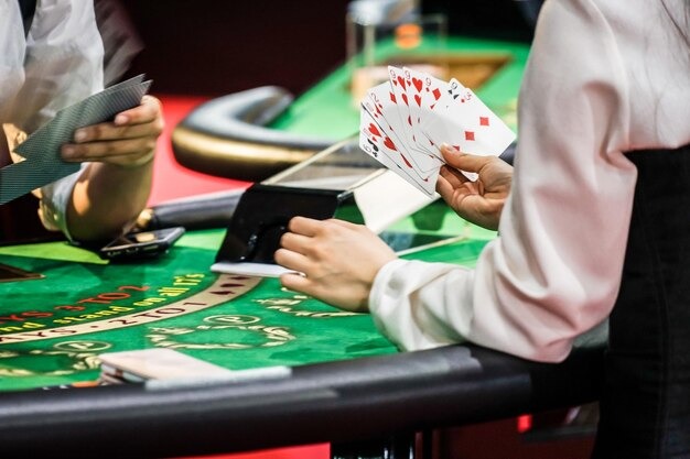 Live Casino Hold'em table with dealer and community cards displayed